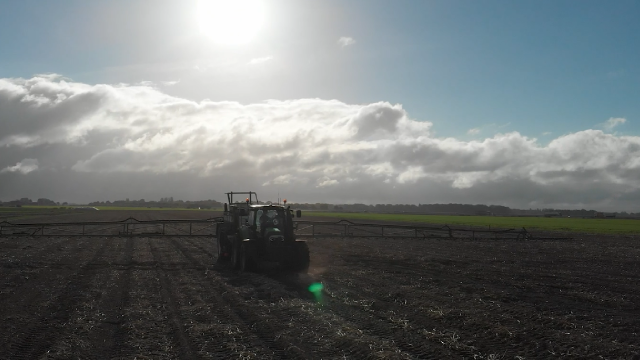 Picture of a tractor in a field, Dacom